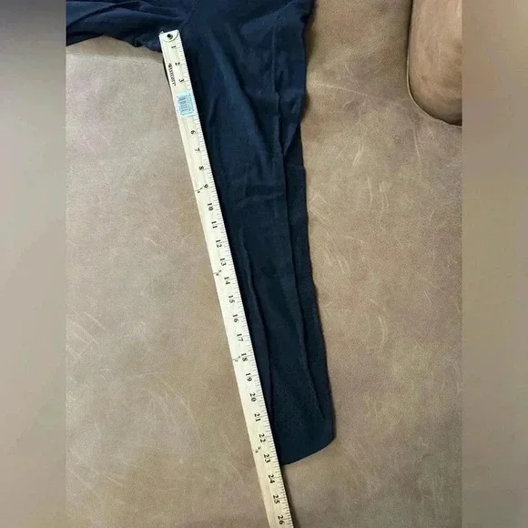 Athleta Black Leggings With Pockets Perforated Bottom Women’s Size Small - Picture 4 of 10